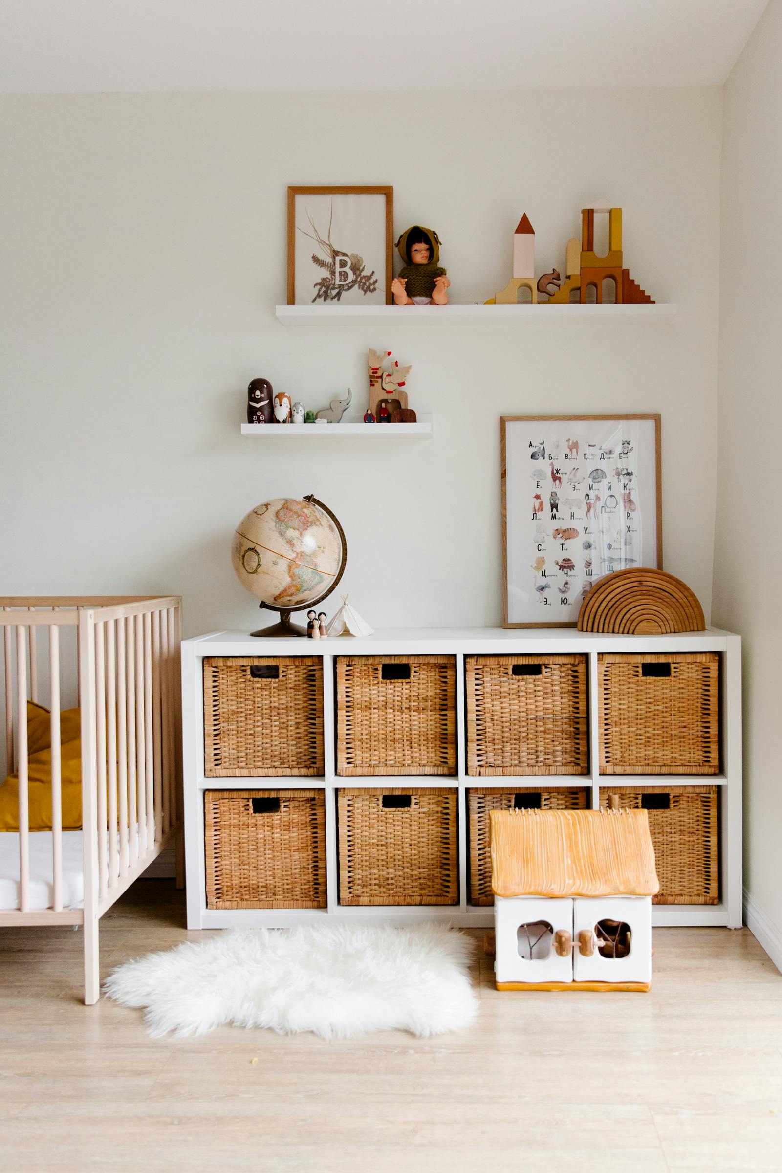 Well-made modular children's furniture in neutral tones arranged in a calm, tidy room